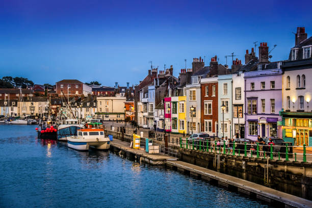 Nightfall Over Waymouth Nightfall Over Waymouth weymouth dorset stock pictures, royalty-free photos & images