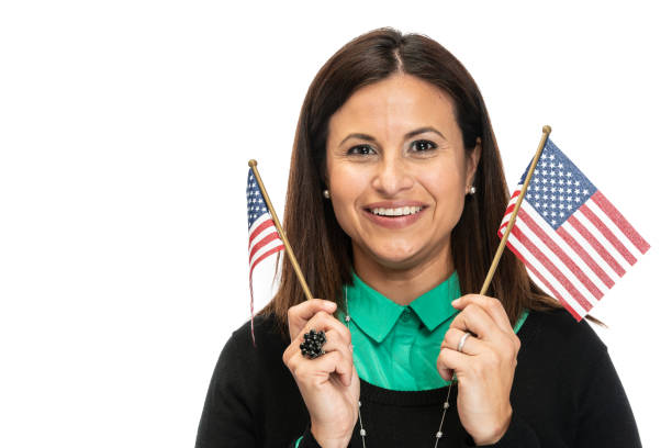 istock Happy hispanic woman posing waving US flags on white background 1186388037