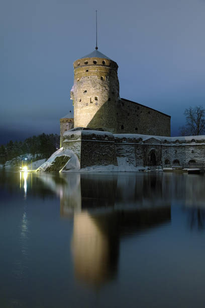 Castle Olavinlinna in Savonlinna, Finland Savonlinna, Finland - January 9, 2013: Castle Olavinlinna (Olofsborg) in winter dusk. The fortress was founded in 1475. Today it is the northernmost medieval stone fortress still standing. etela savo finland stock pictures, royalty-free photos & images