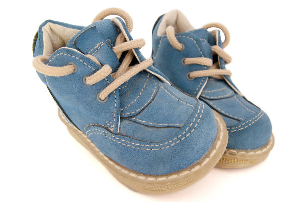 istock sweet small blue baby shoes 1186390755
