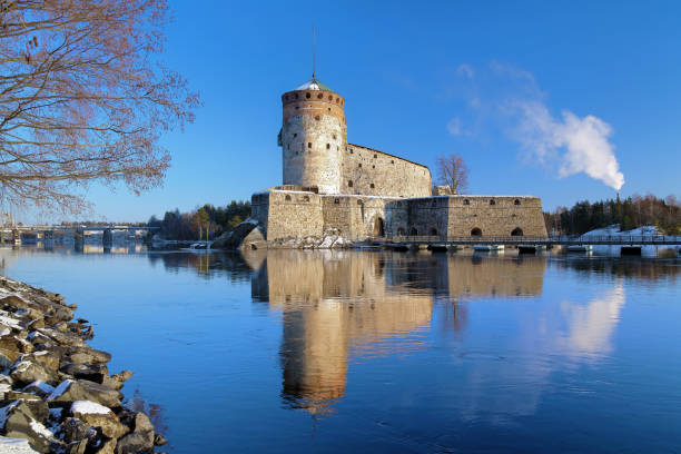 Castle Olavinlinna in Savonlinna, Finland Savonlinna, Finland - January 1, 2012: Castle Olavinlinna (Olofsborg) in winter. The fortress was founded in 1475. Today it is the northernmost medieval stone fortress still standing. etela savo finland stock pictures, royalty-free photos & images