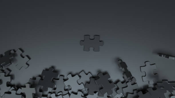 istock 3D Jigsaw puzzle pieces on black background 1186391715
