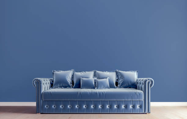 istock Horizontal mock-up poster, modern interior design, tufted sofa, blue wall background with free space above on top, 3d render, 3d illustration 1186393050
