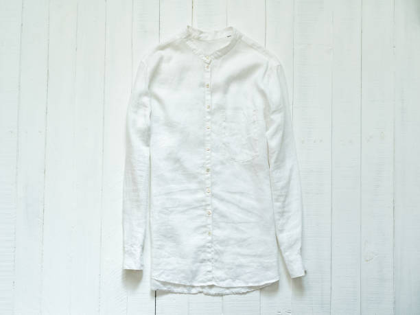 istock White classic shirt on a white background. Clothing concept 1186394570