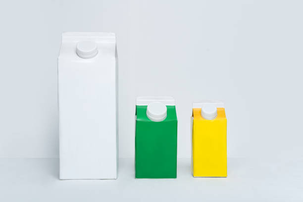 Three carton box or packaging of tetra pack with a cap on a white background.