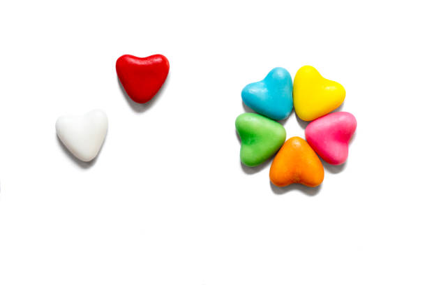 istock Colorful candy hearts on a white background with copy space 1186397628