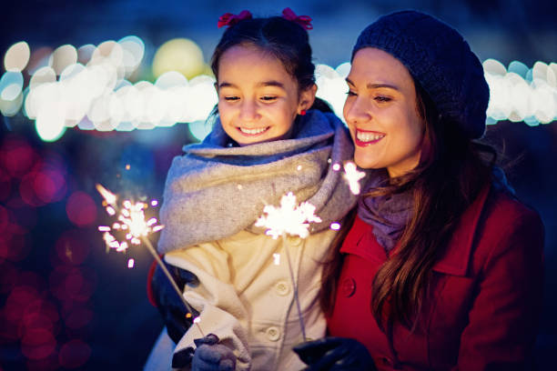 istock Mother is hugging her daughter at Christmas 1186397661