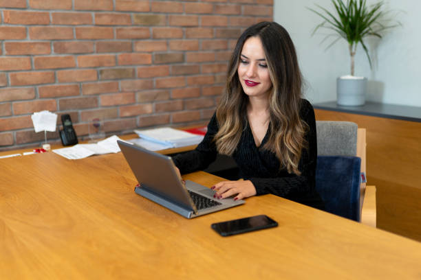 istock A woman who works on a computer at work 1186400058