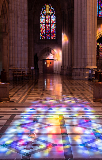 Washington, DC - 4 November 2019: Sunbeams from the stained glass windows of National Cathedral in Washington DC