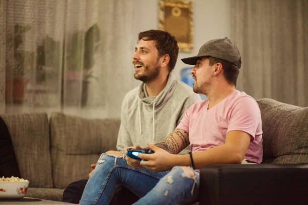istock Good friends playing games at home 1186406902