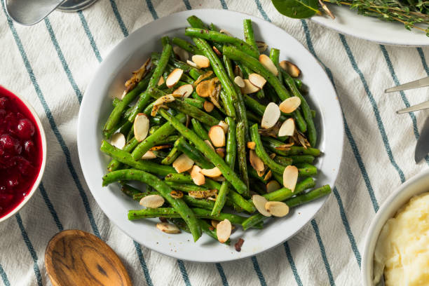 Homemade Sauteed Green Beans Homemade Sauteed Green Beans with Almonds for Thanksgiving sauteed stock pictures, royalty-free photos & images