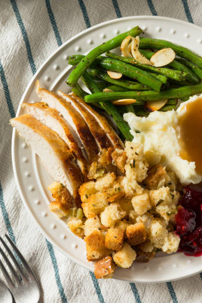 istock Homemade Thanksgiving Turkey Dinner with Stuffing Potatoes 1186408292