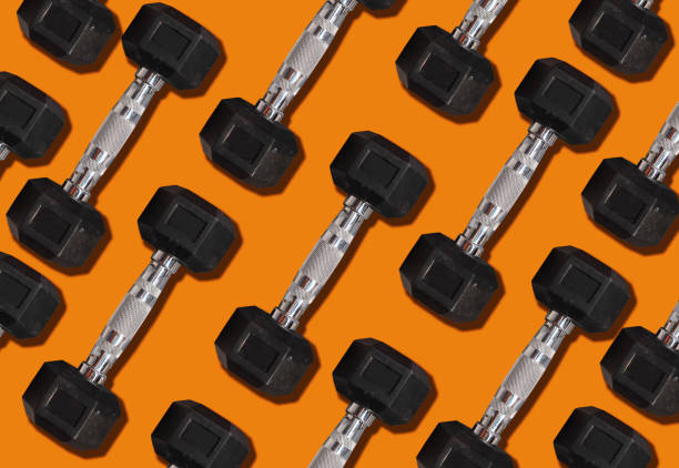 istock Dumbbell Dumbbell on the  background 1186408369