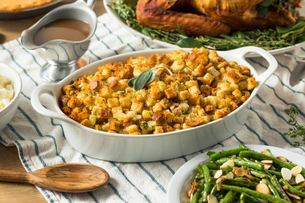 Homemade Thanksgiving Dressing Stuffing Homemade Thanksgiving Dressing Stuffing Sage and Butter stuffing food photos stock pictures, royalty-free photos & images