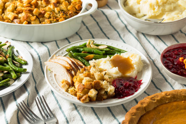 istock Homemade Thanksgiving Turkey Dinner with Stuffing Potatoes 1186409262