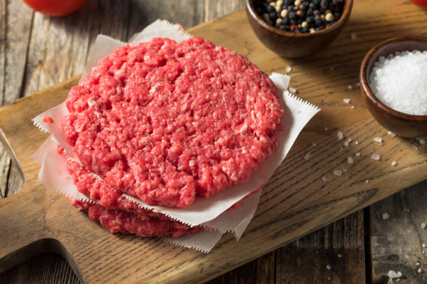 istock Raw Red Organic Hamuburger Pattys 1186410245