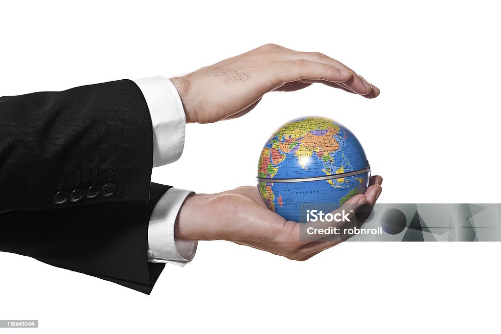 Geschäftsmann hält einen Globus, isoliert auf weiss - Lizenzfrei Blau Stock-Foto