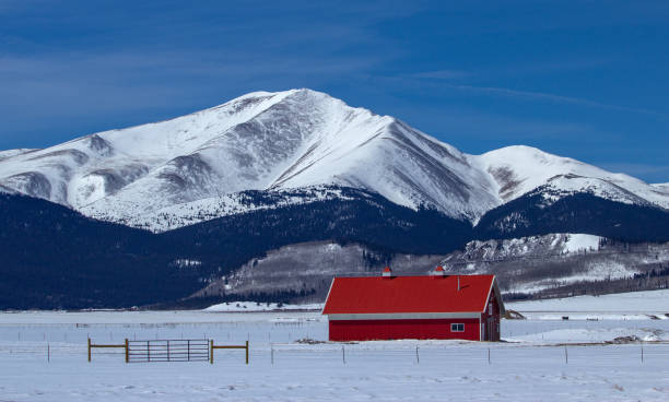 istock Red Barn and Snow Covered Mountain, Breckenridge, Colorado 1186413772