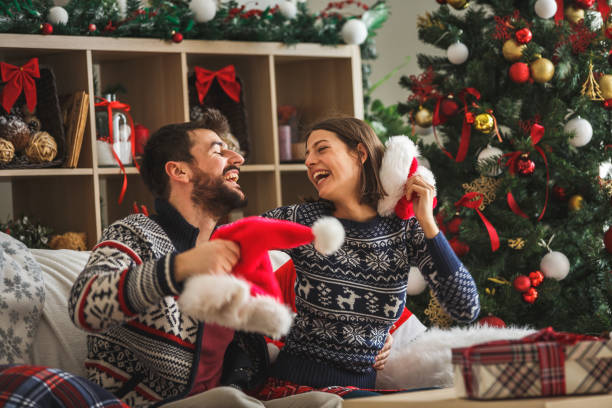 istock Cheerful couple celebrating New Year 1186414545
