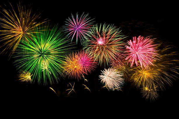 istock Colorful fireworks on midnight sky background. 1186415411