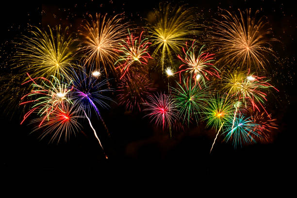 istock Colorful fireworks on midnight sky background. 1186415441