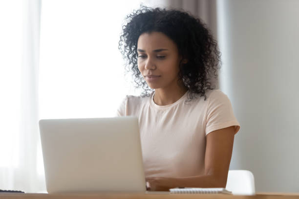 istock African woman spend time in internet using computer chatting online 1186418502