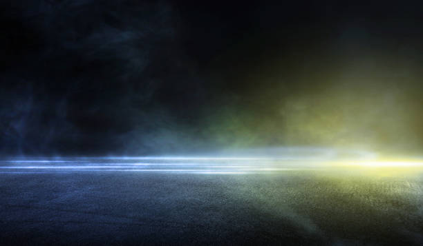 istock 3D rendering Abstract asphalt light blue and orange in a dark empty street with smoke, Dark background scene of empty street night city. 1186424576