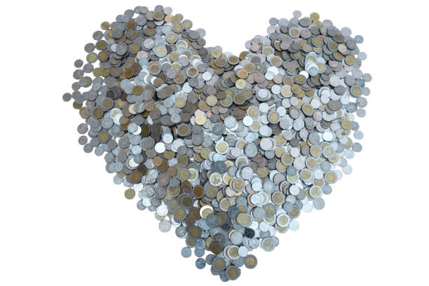 Thai Baht lots coin Arranged in heart shape on with white background texture, Investment and saving concept, Money stack for business planning investment, A lot of money\