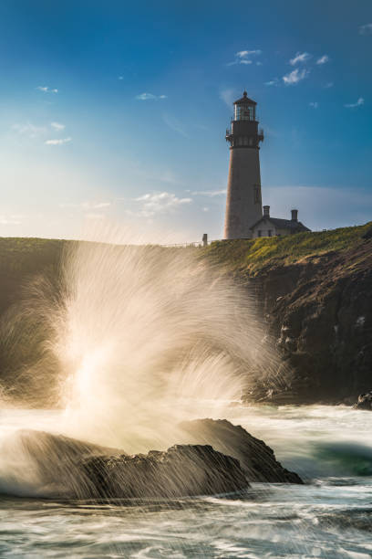 istock The ocean wave splash and a lighthouse 1186433761