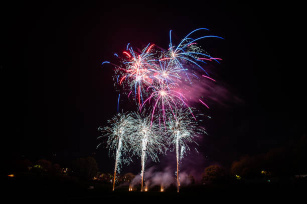 istock Large fireworks in formation illuminating the sky 1186434346