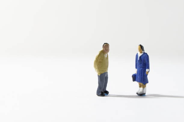 A HIGH SCHOOL GIRL TALKING TO AN OLD MAN.