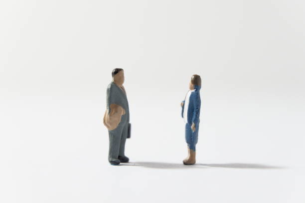 istock a man and woman who talk 1186435313
