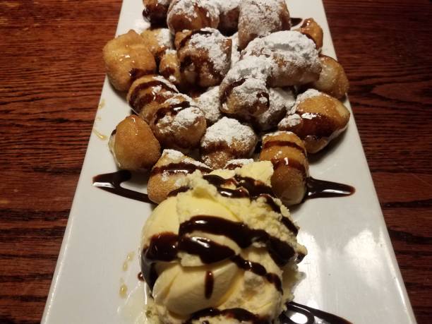 istock fried dough and chocolate sauce and ice cream 1186439534
