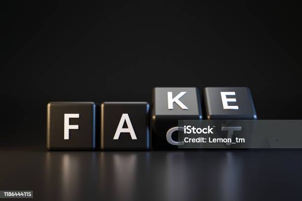 Black Dice And Fact Or Fake With April Fools Day Concept On Dark Background Misleading And Changing Communication April Fools Day Realistic 3d Render Stock Photo - Download Image Now
