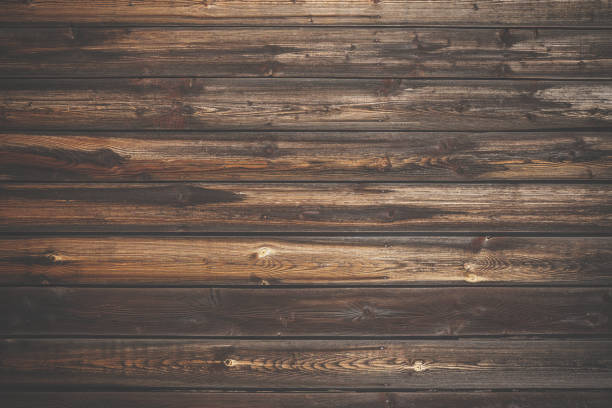 istock dark brown wood background 1186447916