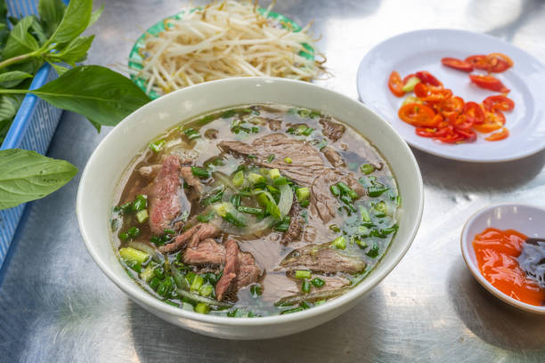 istock Pho beef noodles soup served with vegetables and bean sprouts 1186452643