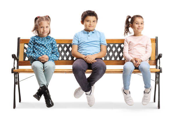 Portrait of children sitting on stage theater