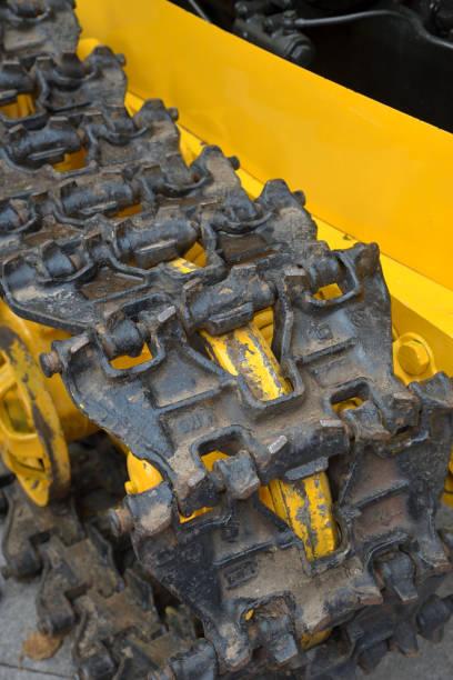 istock Old caterpillar on yellow tractor 1186461285