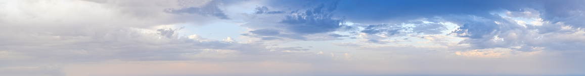 Blue morning sky with clouds (wide high resolution background panorama).