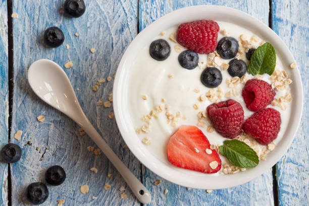 istock Yogurt with fresh berries and oat flakes 1186463232