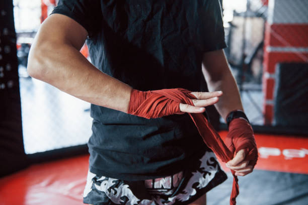 istock Preparation before the training. Close up shot of young boxer 1186466109