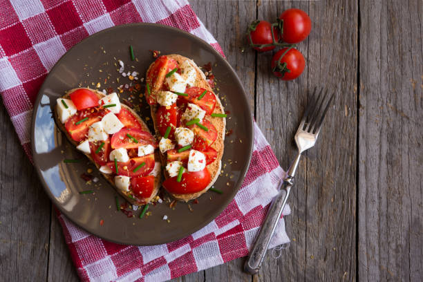istock Italian bruschetta with tomatoes and mozzarella 1186467636