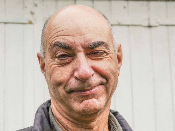 istock Senior male with funny faces 1186470806