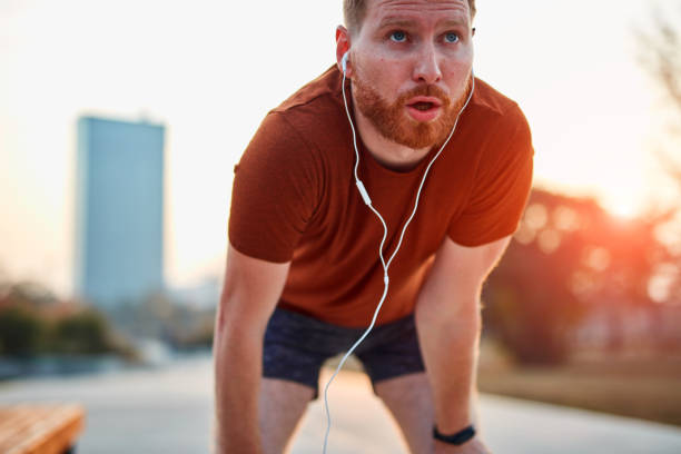 istock Modern young man working out in an urban park. 1186473274