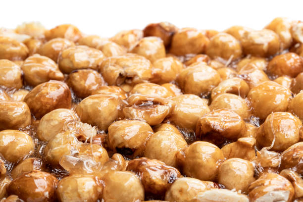 istock Italian hazelnut brittle isolated on white background 1186474720