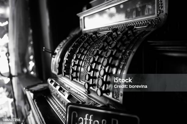 Black And White Image Of An Old 19th Century Cash Register Selective Focus On Cashier Buttons Stock Photo - Download Image Now