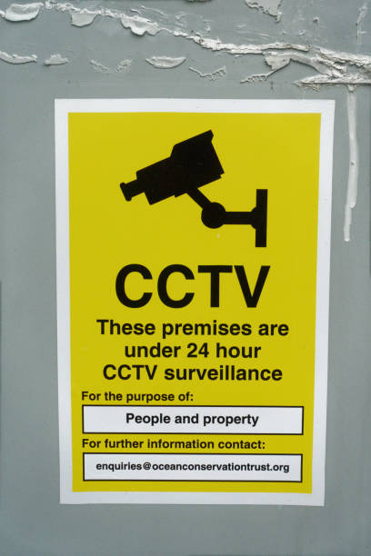 Plymouth England November 2019. Yellow CCTV public information warning sign with camera logo