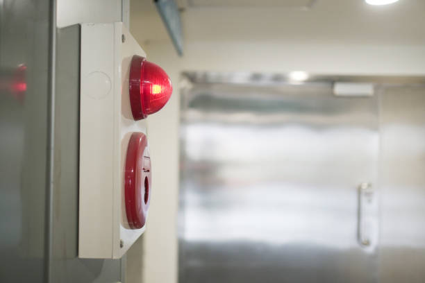 istock Fire Equipment. Includes fire extinguisher, Alarm bells and warning lights. 1186477628