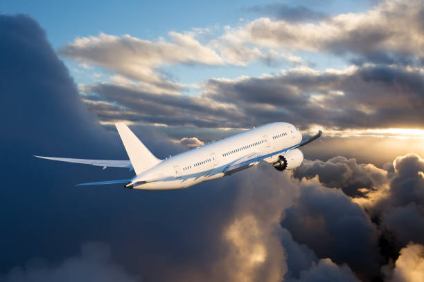 istock The passenger plane flies away beyond the horizon 1186479483