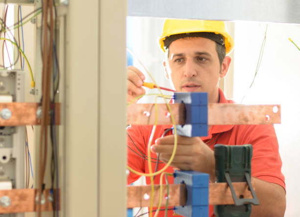 istock Electrician working on equipment in control room 1186480811